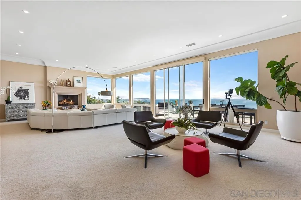 931 La Jolla Rancho Road La Jolla, CA 92037 - Photo 8 of 25 a living room with furniture and a large window
