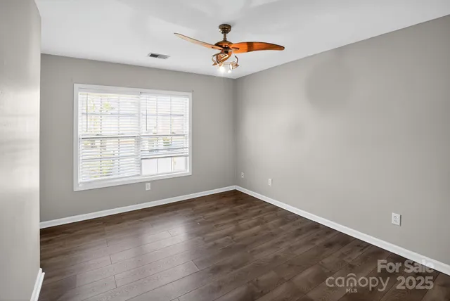 a kitchen with a stove and a refrigerator