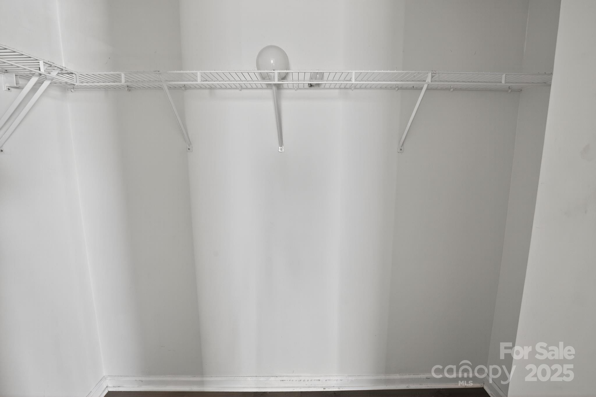 105 Whitton Court Lexington, SC 29073 - Photo 28 of 33 a view of a room with racks on the wall