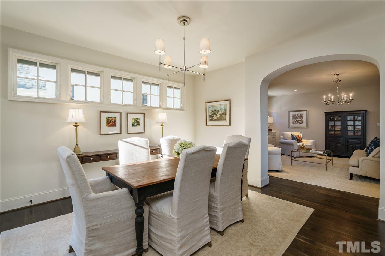 2129 Cowper Drive Raleigh, NC 27608 - Photo 12 of 25 a view of a dining room with furniture and wooden floor