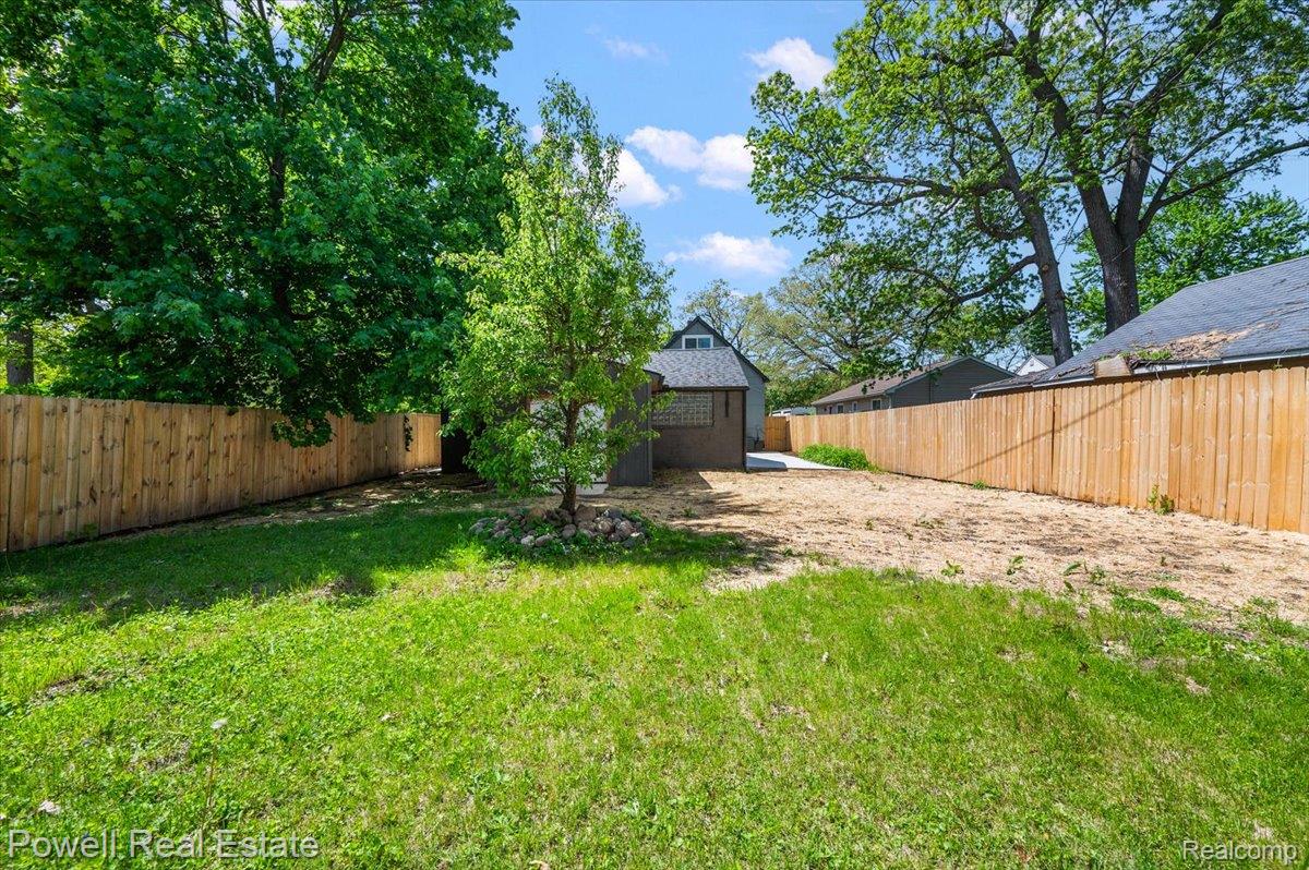6837 Hatchery Road Waterford, MI 48327 - Photo 7 of 56 View of fenced backyard