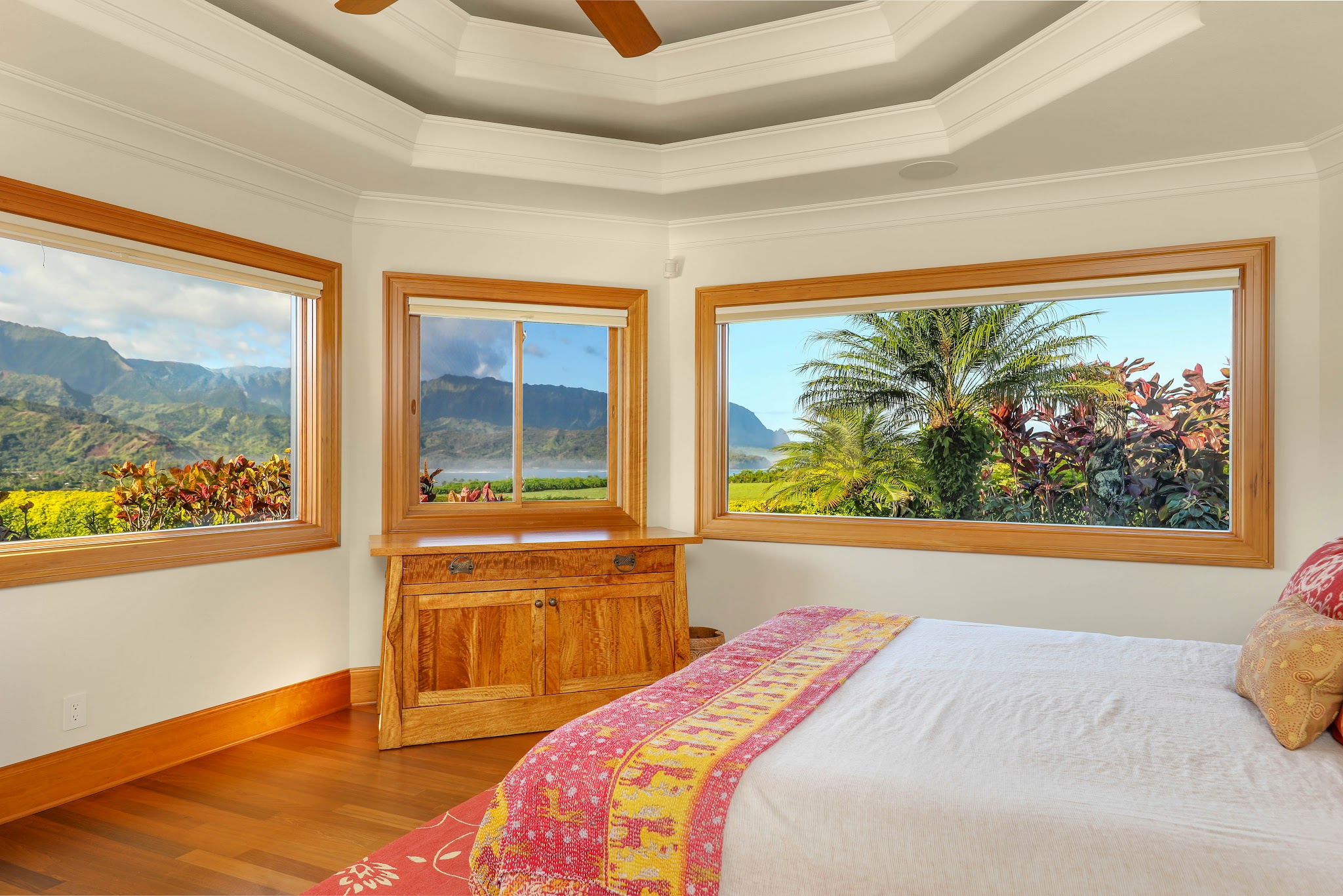 4971 Hanalei Plantation Road Princeville, HI 96722 - Photo 9 of 30 a bedroom with a bed and a large window with outer view