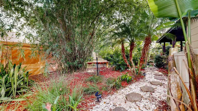 a backyard of a house with lots of green space