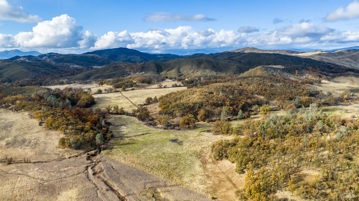 11158 Rocky Creek Road Lower Lake, CA 95457 - Photo 19 of 25 a view of mountain with sunset