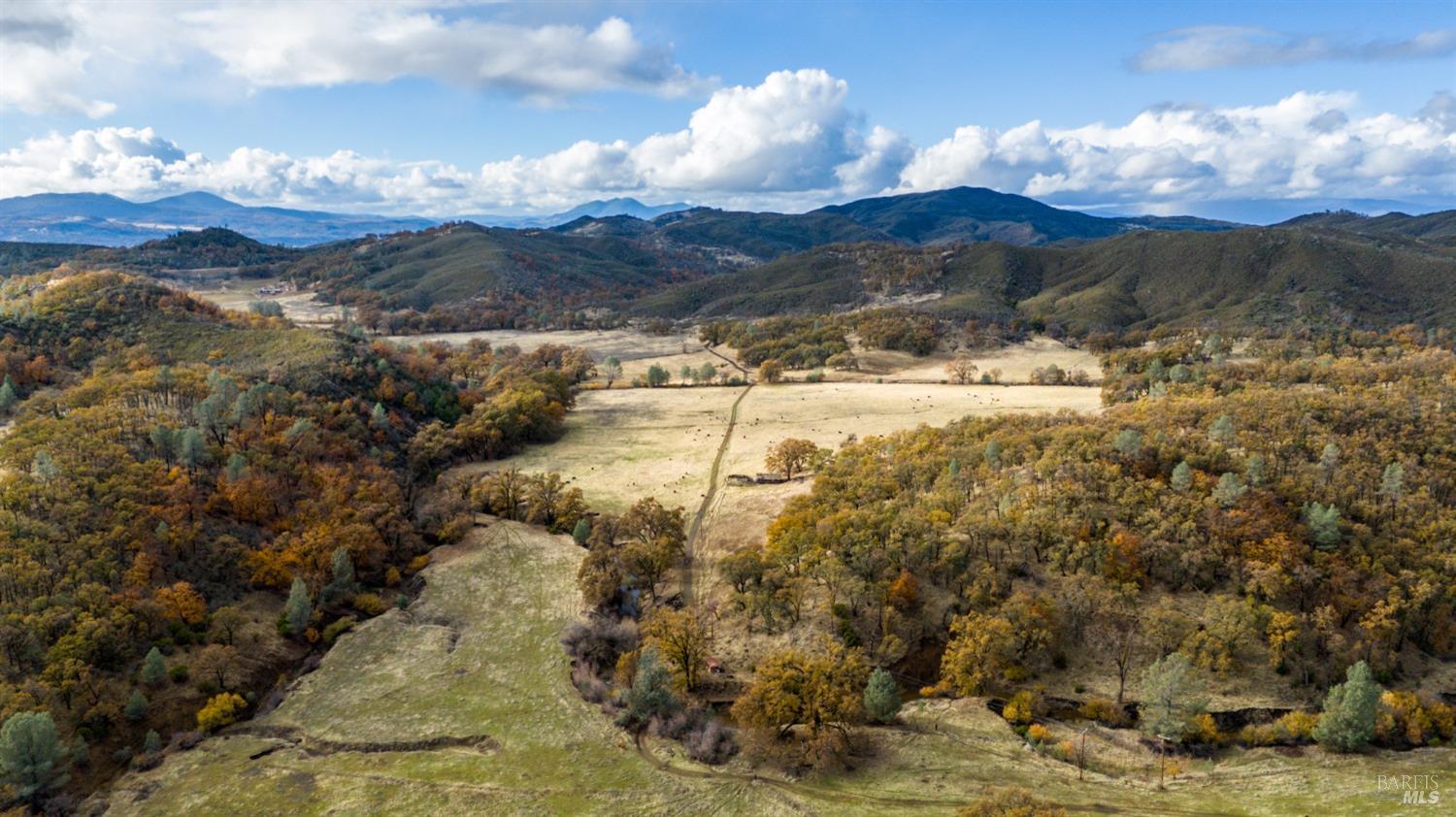 11158 Rocky Creek Road Lower Lake, CA 95457 - Photo 20 of 25 a view of a houses with a mountain