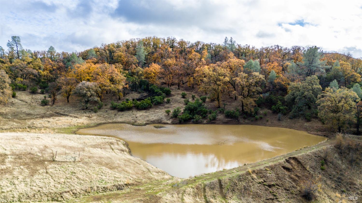 11158 Rocky Creek Road Lower Lake, CA 95457 - Photo 24 of 25 a view of a swimming pool with an outdoor space and seating area