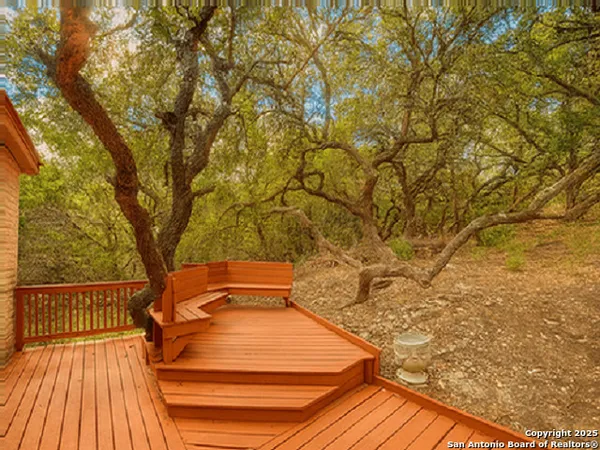 a backyard of a house with wooden floor
