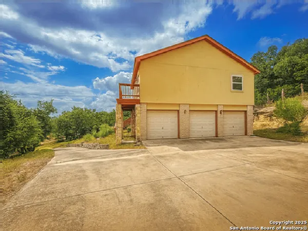 a view of a house with a street