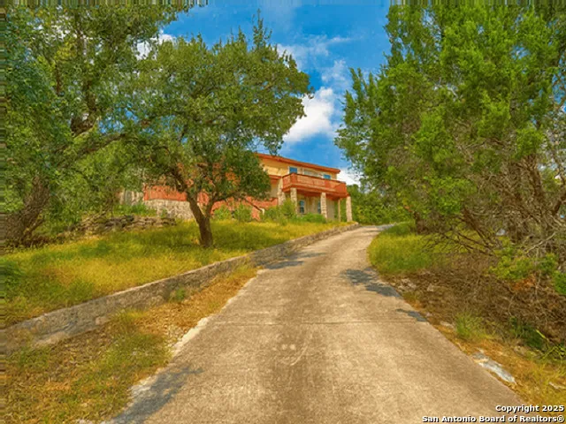a view of swimming pool with a yard