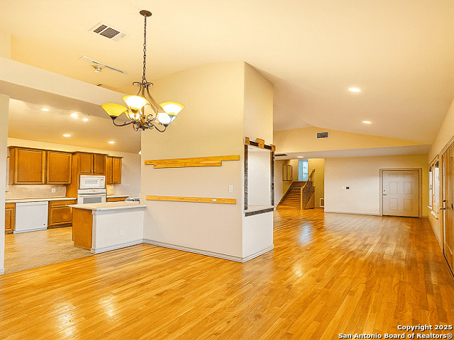 412 Moonlight Walk San Antonio, TX 78260 - Photo 6 of 26 a view of a kitchen with a sink and microwave