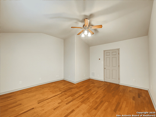 412 Moonlight Walk San Antonio, TX 78260 - Photo 9 of 26 a view of empty room with wooden floor
