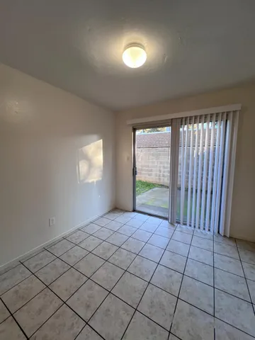 a view of an empty room and window