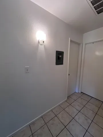 a bathroom with a shower and a sink