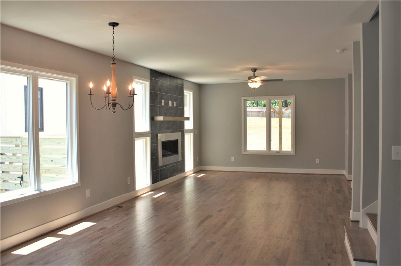 Living room enhanced by so much natural light and looking out to the fabulous covered outdoor living space. Living Room