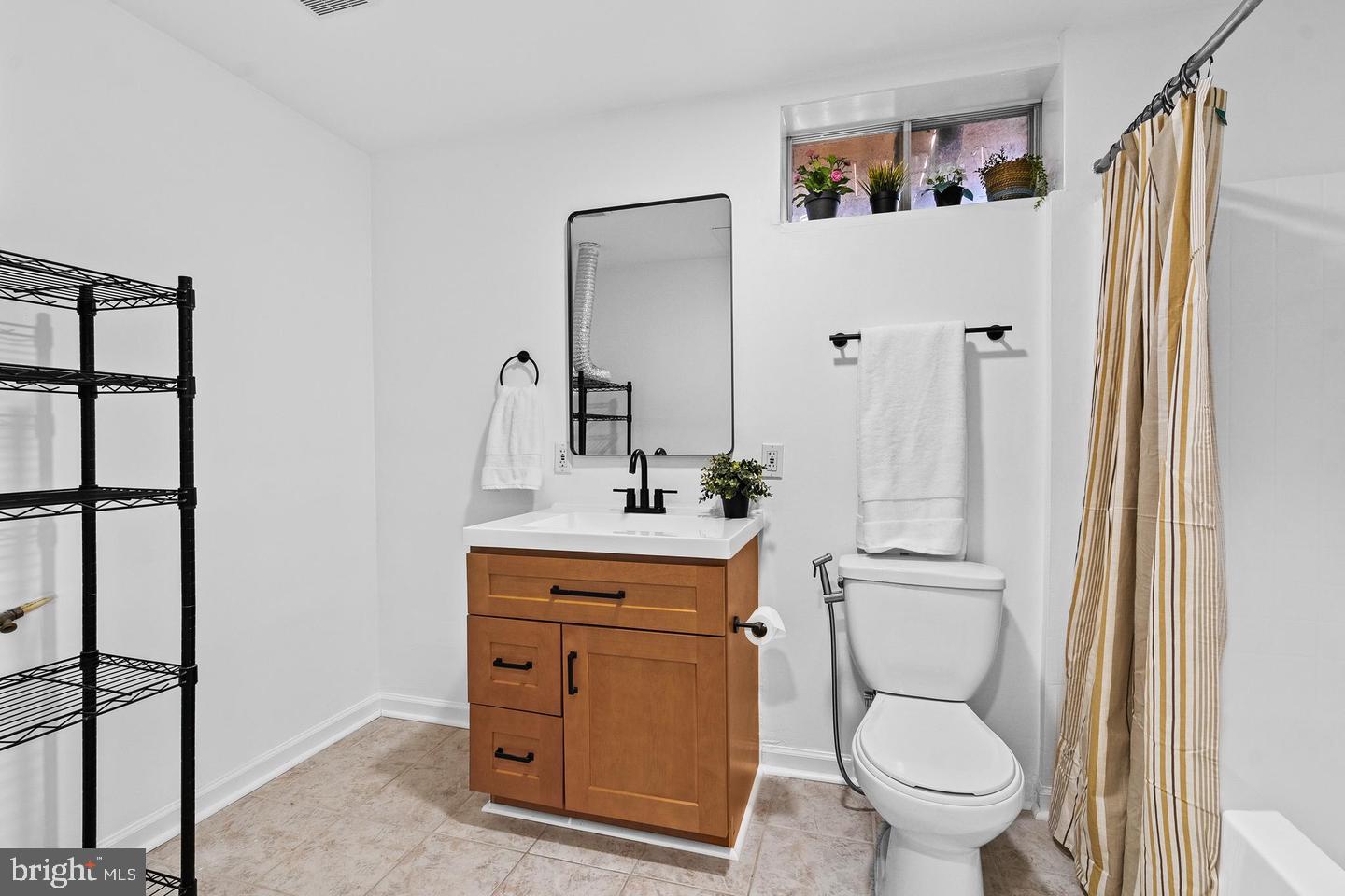 42827 Spinks Ferry Road Leesburg, VA 20176 - Photo 38 of 56 lower level full bath with washer dryer hook up