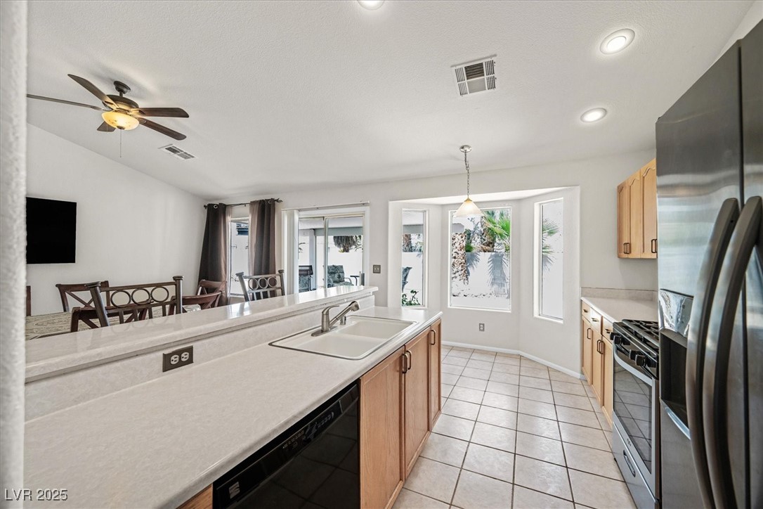 130 Park Ridge Lane Henderson, NV 89002 - Photo 13 of 69 Kitchen with appliances with stainless steel finis