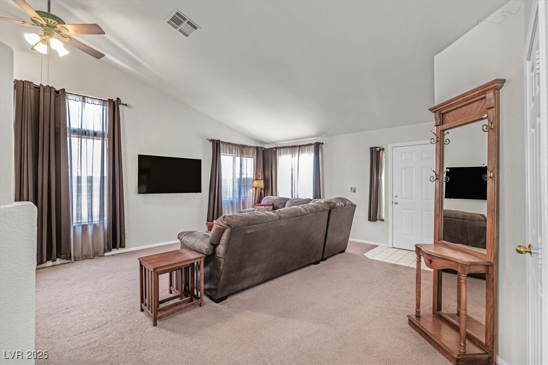 130 Park Ridge Lane Henderson, NV 89002 - Photo 4 of 69 Living room with vaulted ceiling, light colored ca