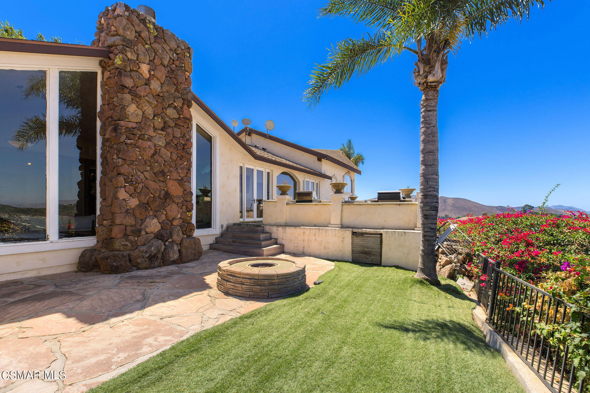 15660 LaPeyre Road Moorpark, CA 93021 - Photo 30 of 84 a front view of a house with garden