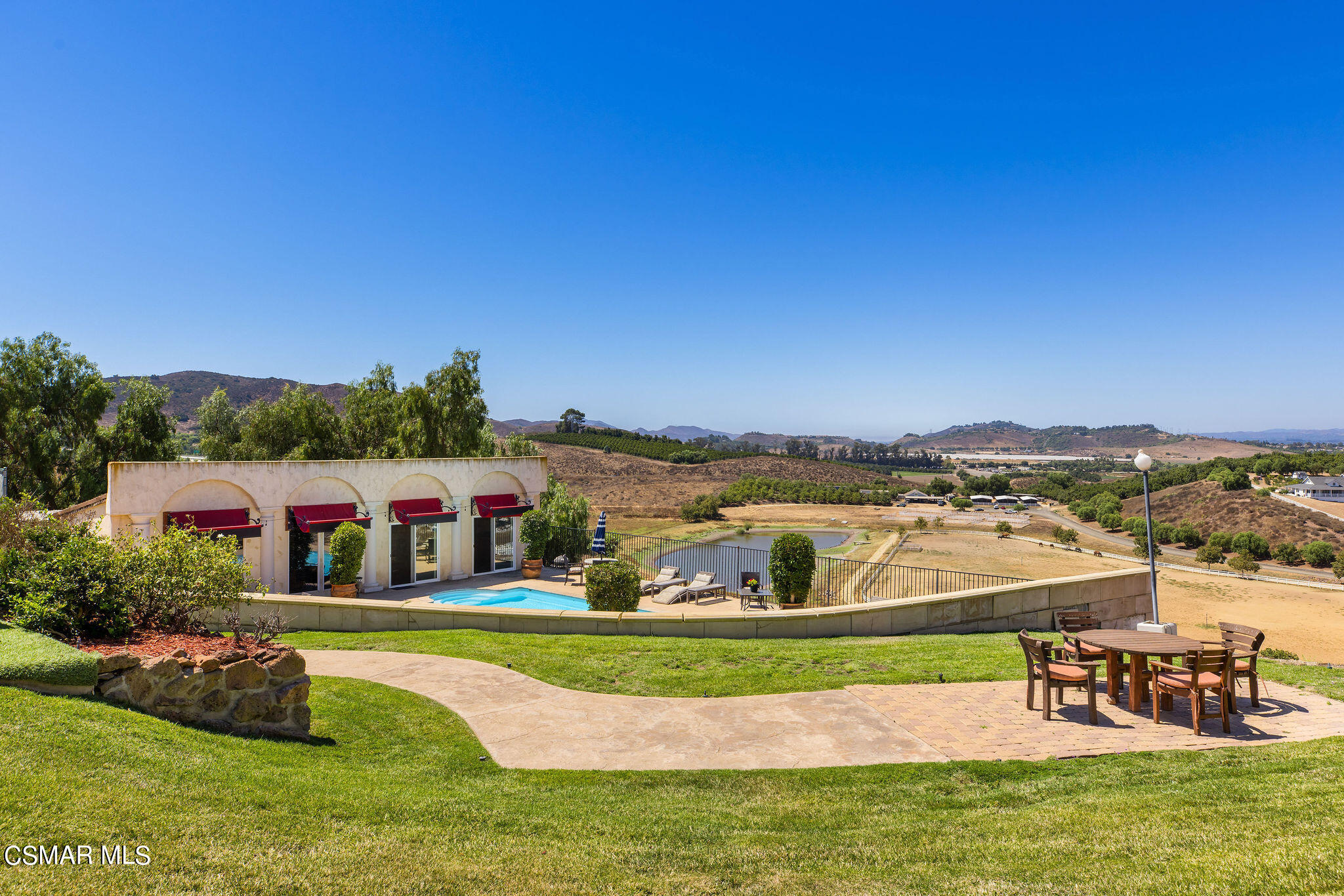 15660 LaPeyre Road Moorpark, CA 93021 - Photo 40 of 84 a view of a lake with houses in the back