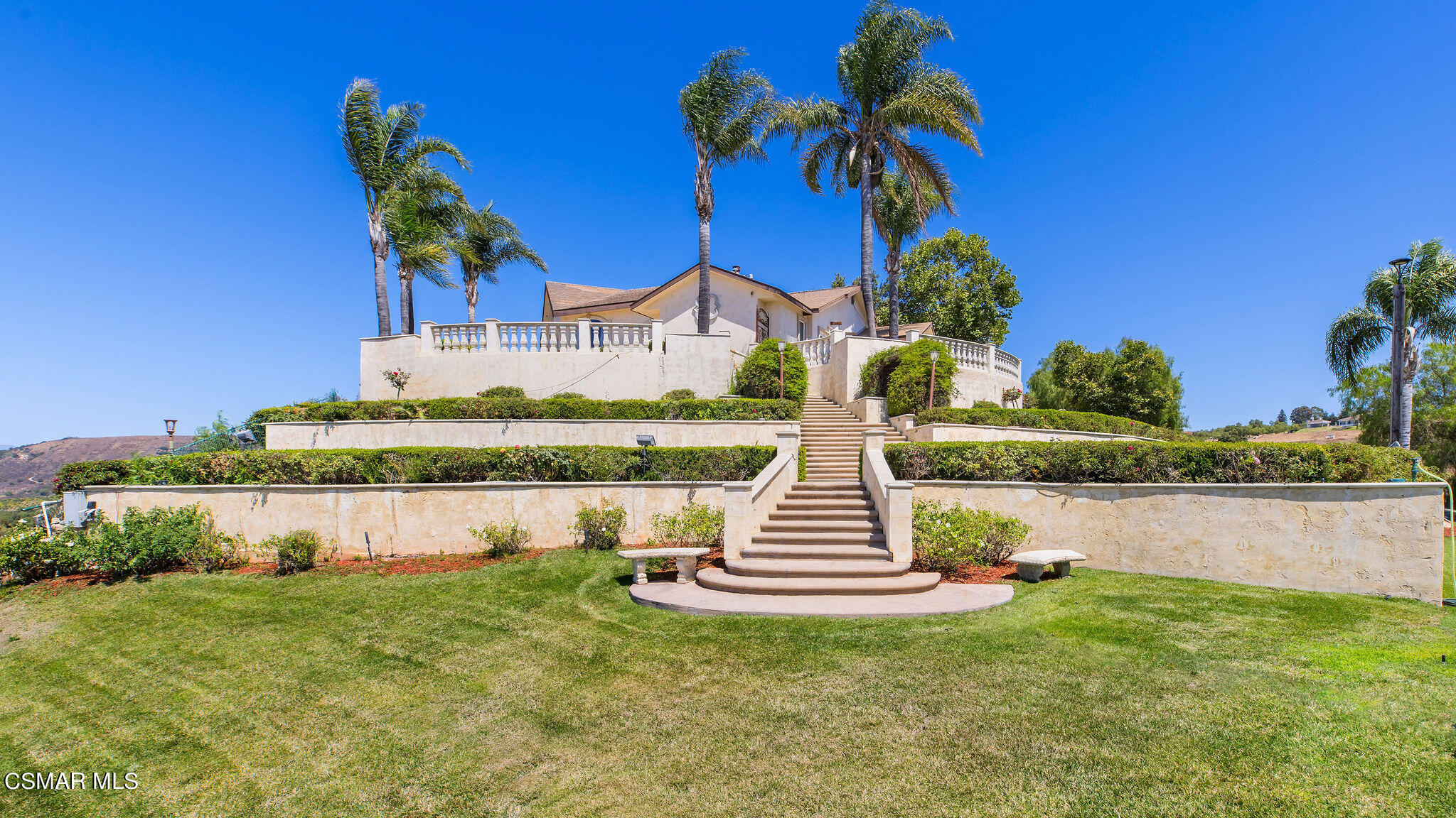 15660 LaPeyre Road Moorpark, CA 93021 - Photo 42 of 84 a front view of a house with a yard and lake view
