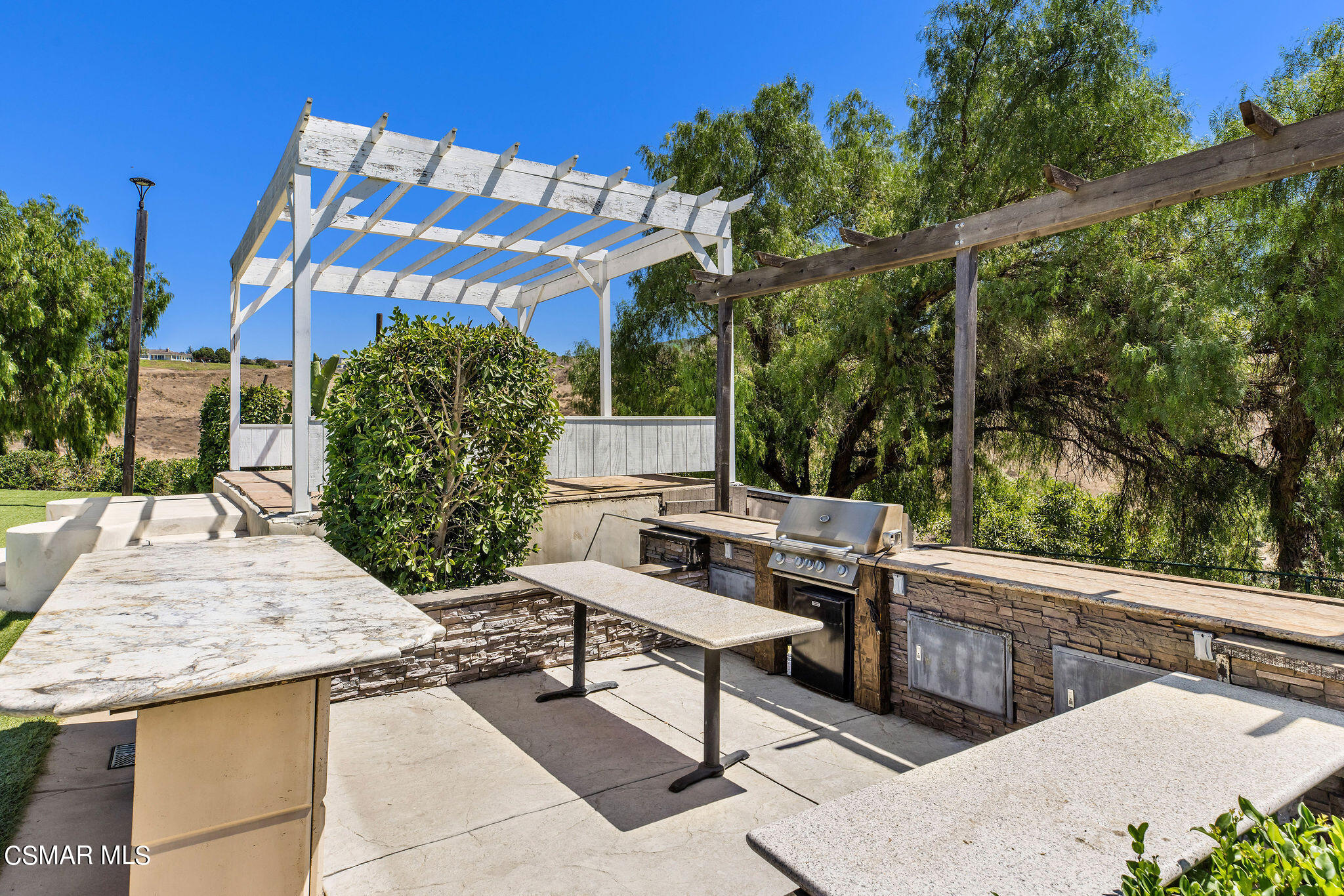 15660 LaPeyre Road Moorpark, CA 93021 - Photo 43 of 84 a view of a chairs and table in the patio