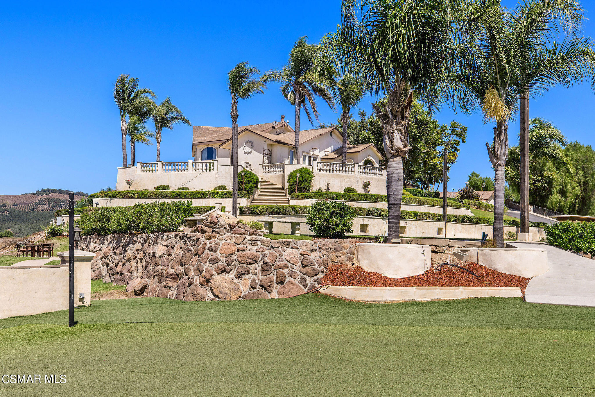 15660 LaPeyre Road Moorpark, CA 93021 - Photo 45 of 84 a view of a house with a yard