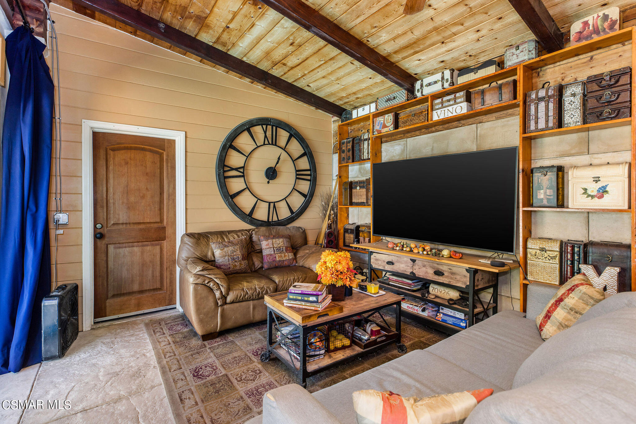 15660 LaPeyre Road Moorpark, CA 93021 - Photo 47 of 84 a living room with furniture and a flat screen tv