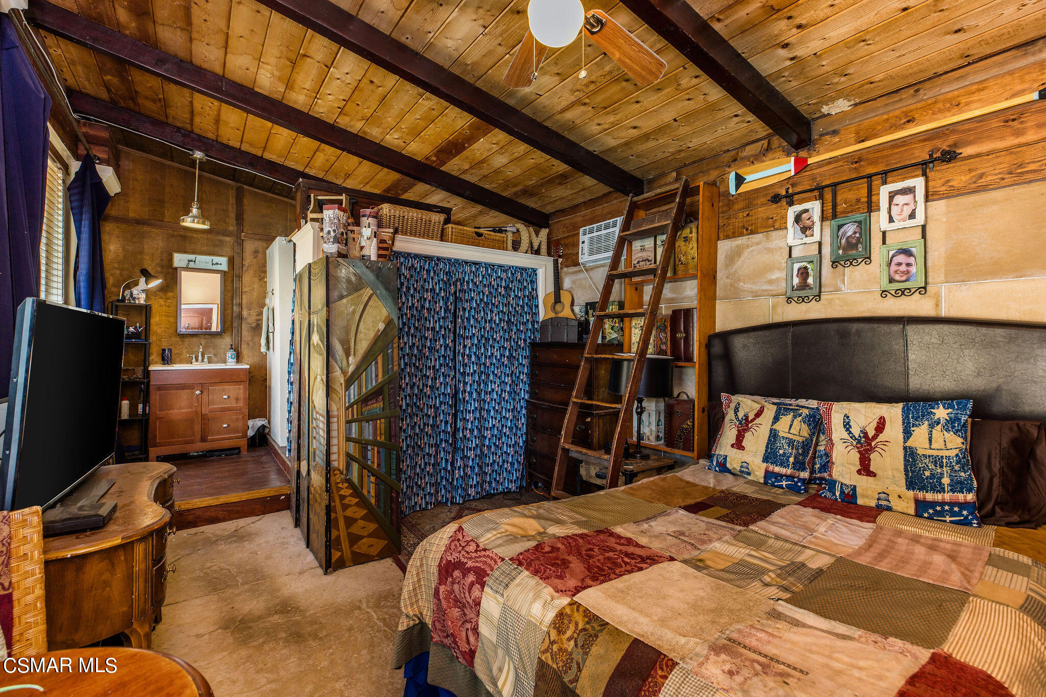15660 LaPeyre Road Moorpark, CA 93021 - Photo 50 of 84 a bed room with a bed and a television