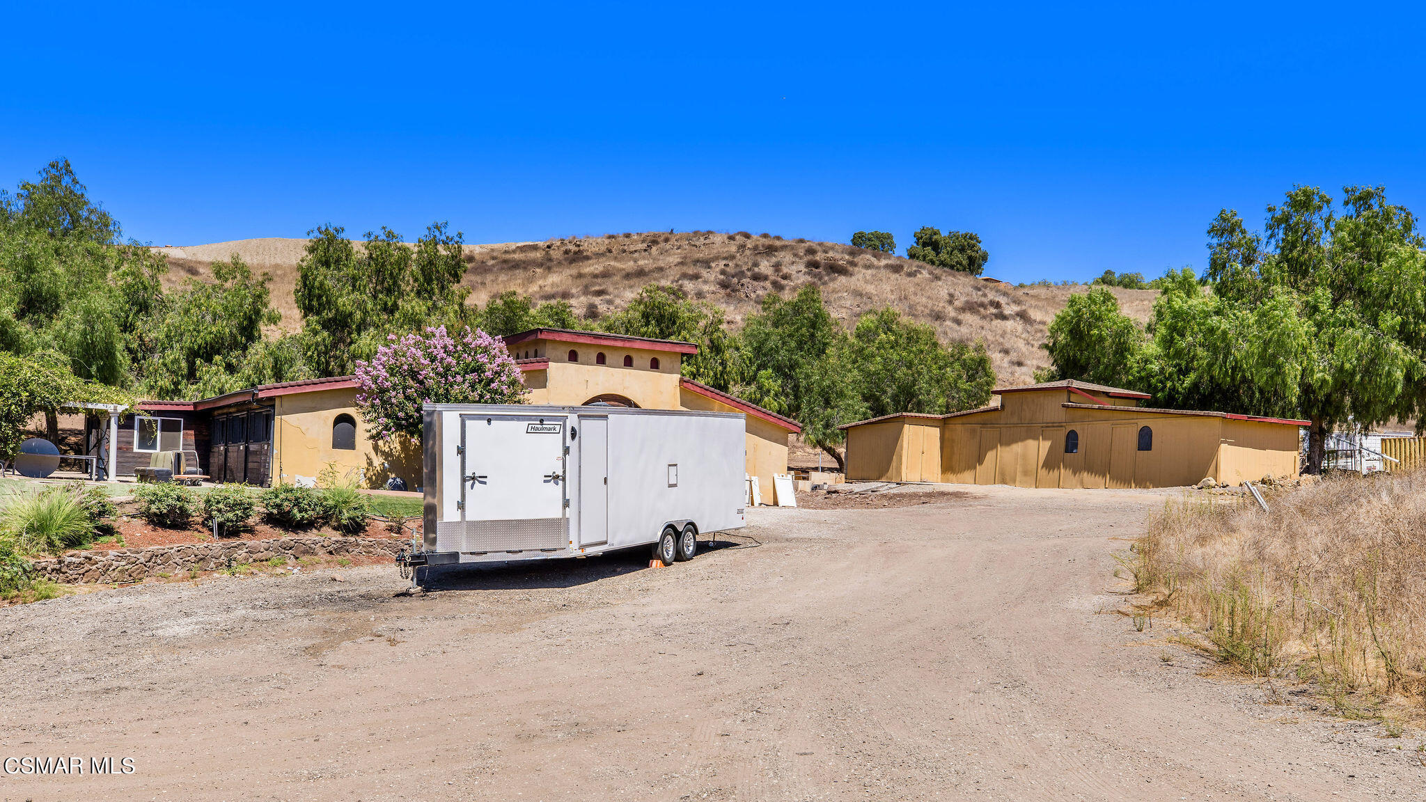 15660 LaPeyre Road Moorpark, CA 93021 - Photo 56 of 84 a view of a house with a yard