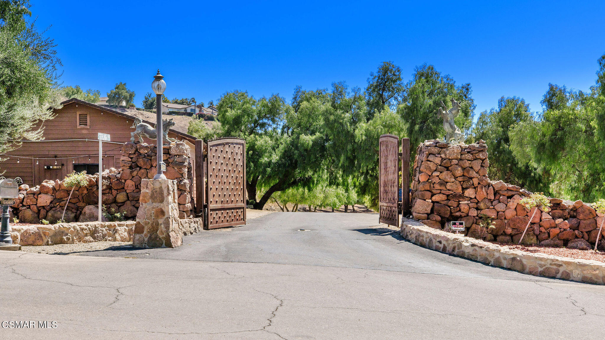 15660 LaPeyre Road Moorpark, CA 93021 - Photo 74 of 84 a view of a street with a building in the background