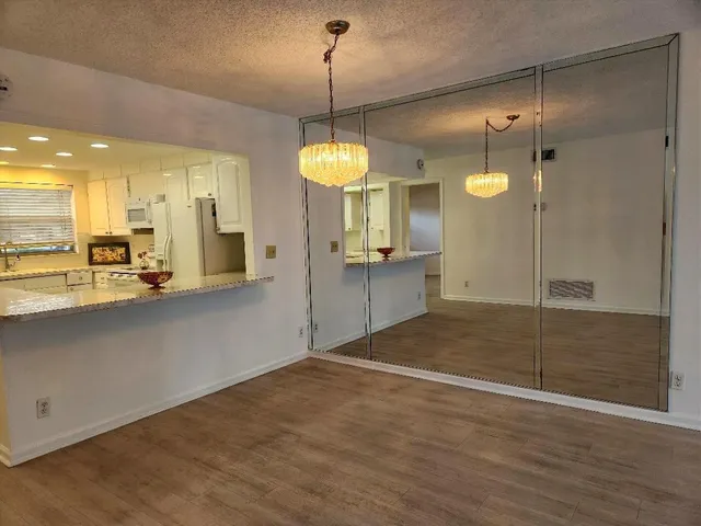 a bathroom with a toilet and shower