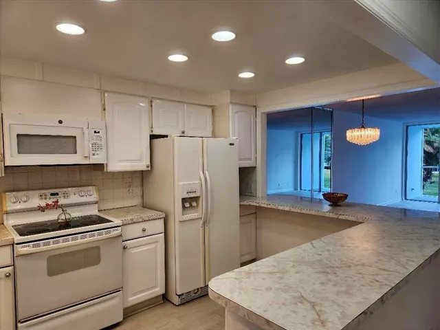 a view of a garden from a balcony