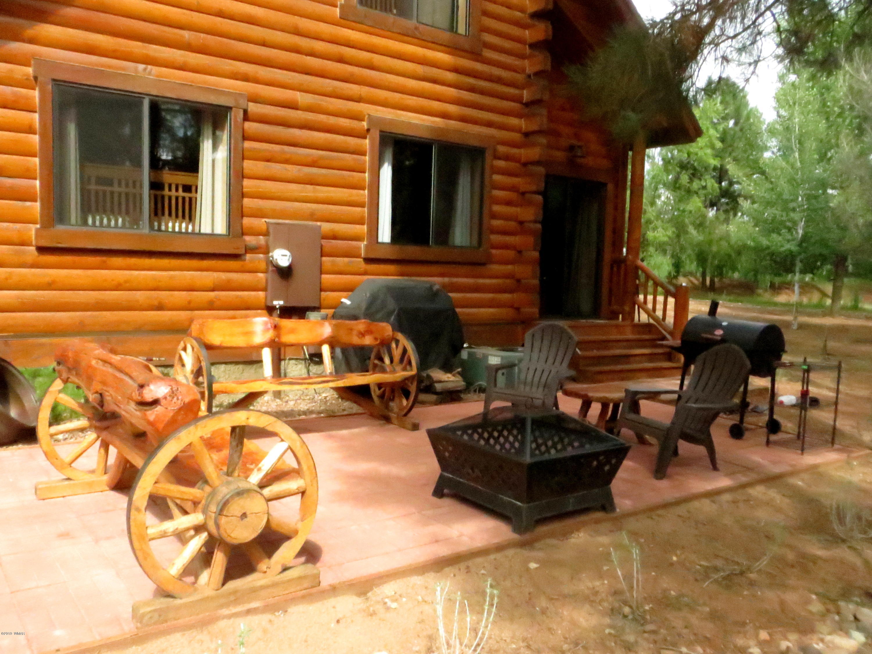 2312 Overgaard Springs Loop Overgaard, AZ 85933 - Photo 7 of 54 a view of a lounge chairs in the patio