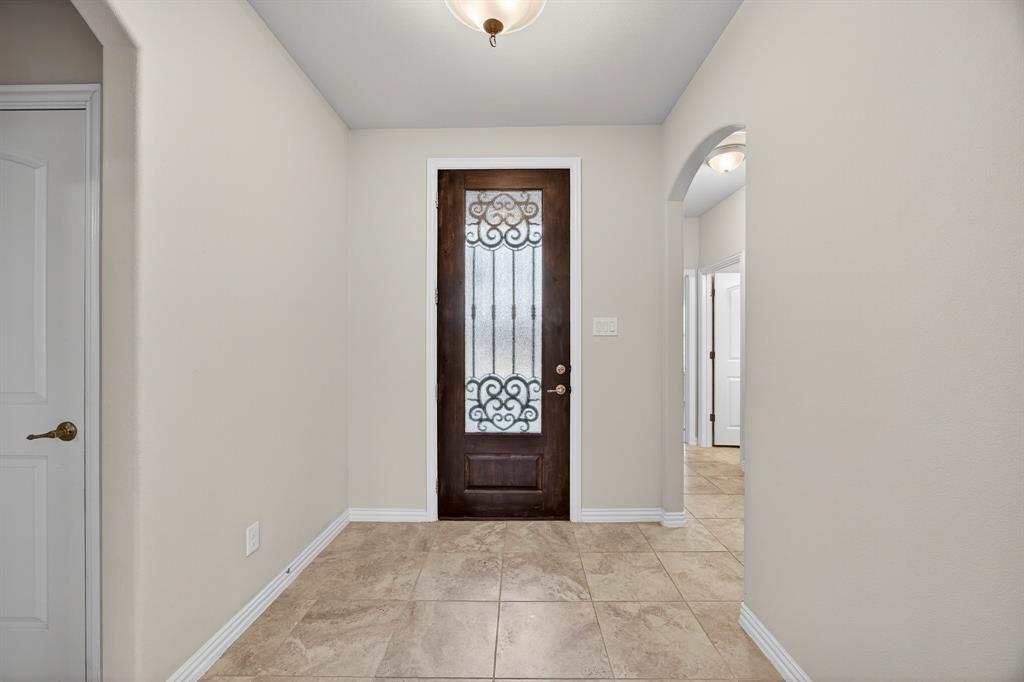 1815 Ladera Way, Unit 1815 Mansfield, TX 76063 - Photo 8 of 24 a view of an entryway with a door