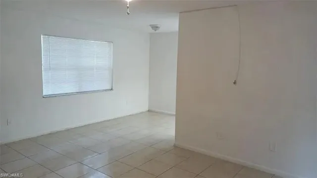 an empty room with a window