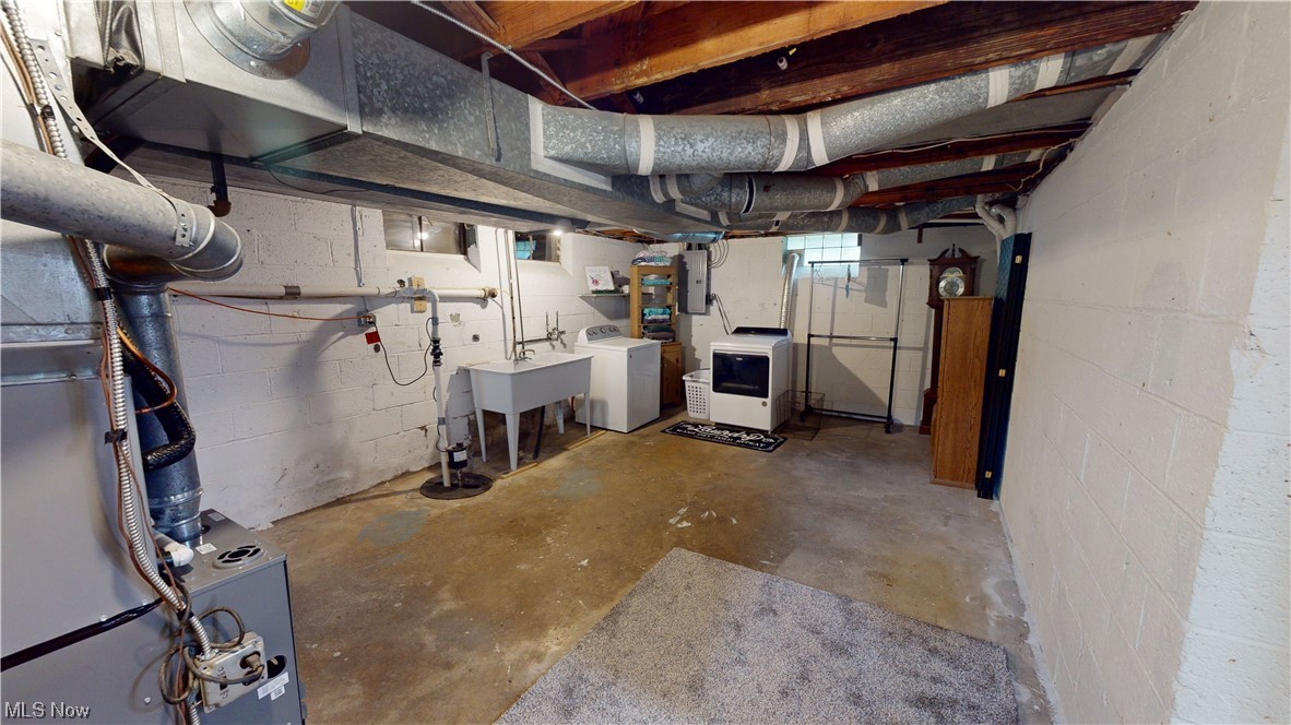 1331 Churchill Road Lyndhurst, OH 44124 - Photo 26 of 35 Basement featuring independent washer and dryer and sink