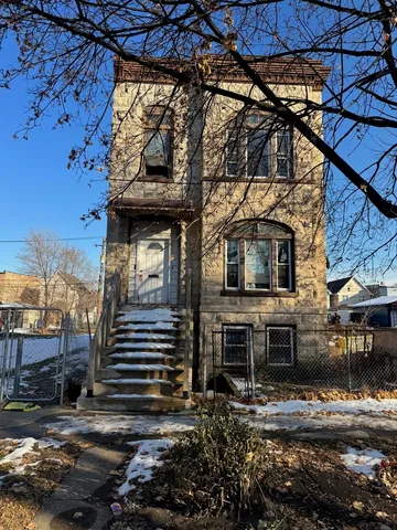 a view of a house with a door and chair