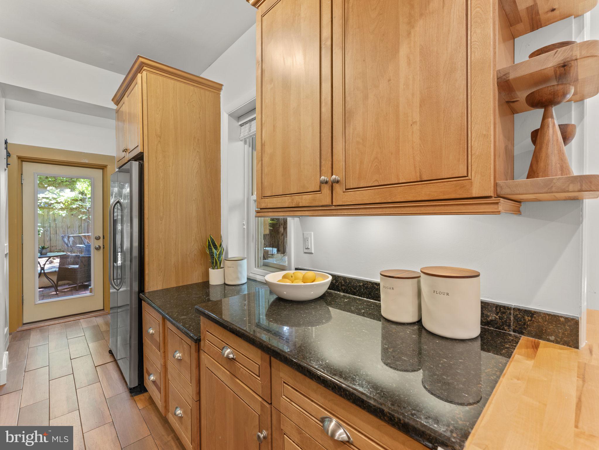 407 5th Street Northeast Washington, DC 20002 - Photo 13 of 41 a kitchen with a sink and wooden floor