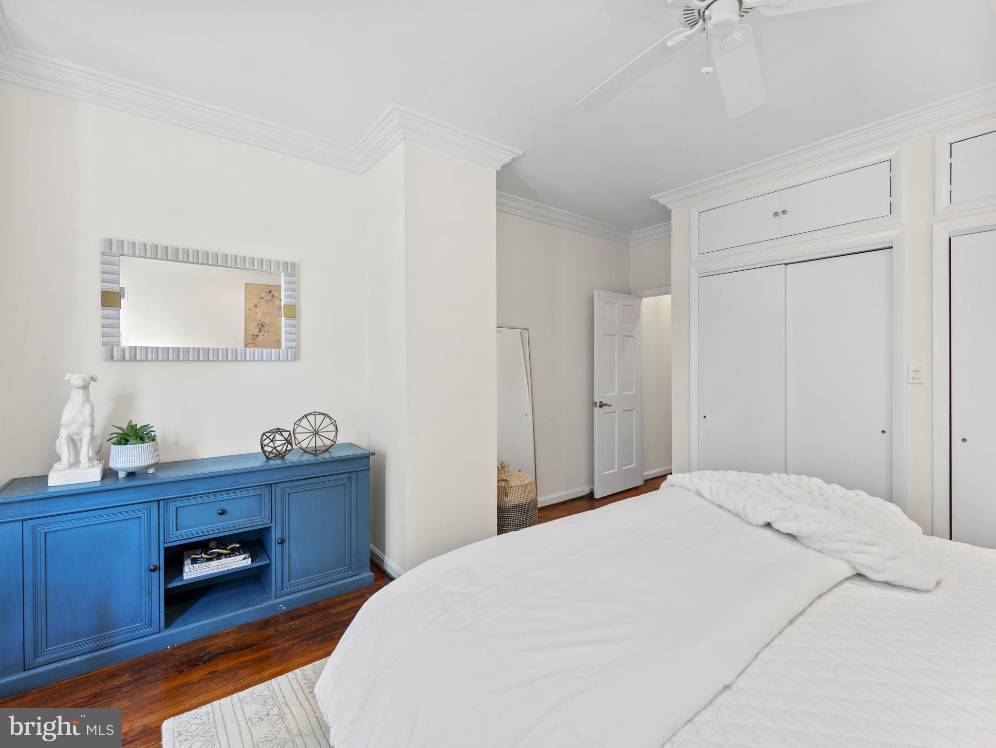 407 5th Street Northeast Washington, DC 20002 - Photo 21 of 41 a bedroom with a bed and a desk
