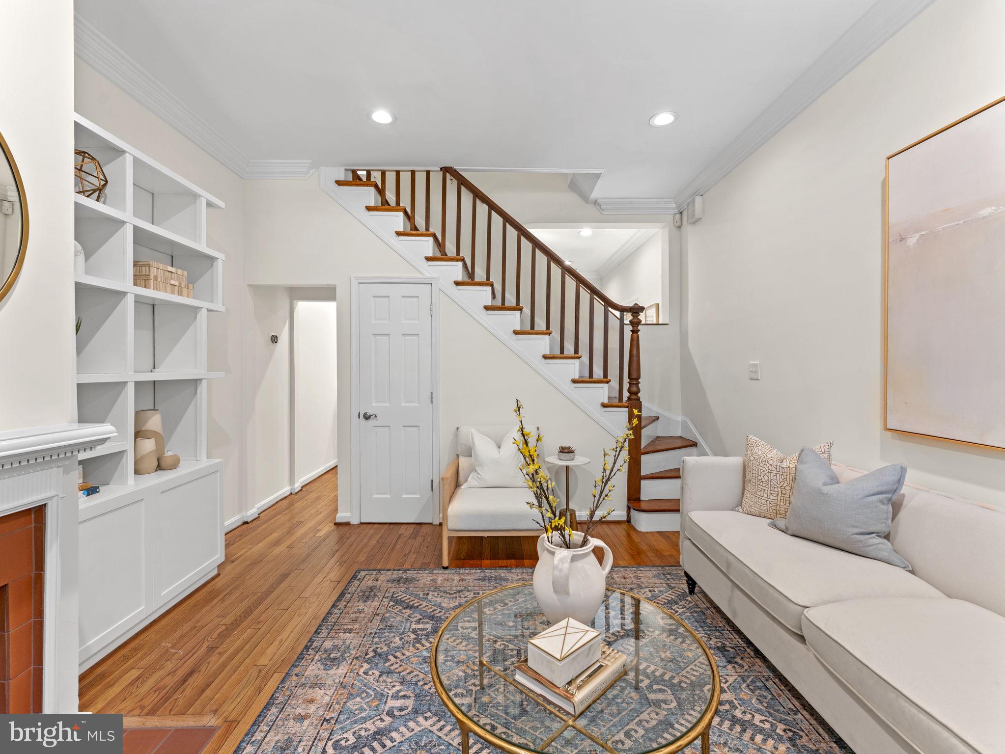407 5th Street Northeast Washington, DC 20002 - Photo 3 of 41 a living room with furniture and wooden floor