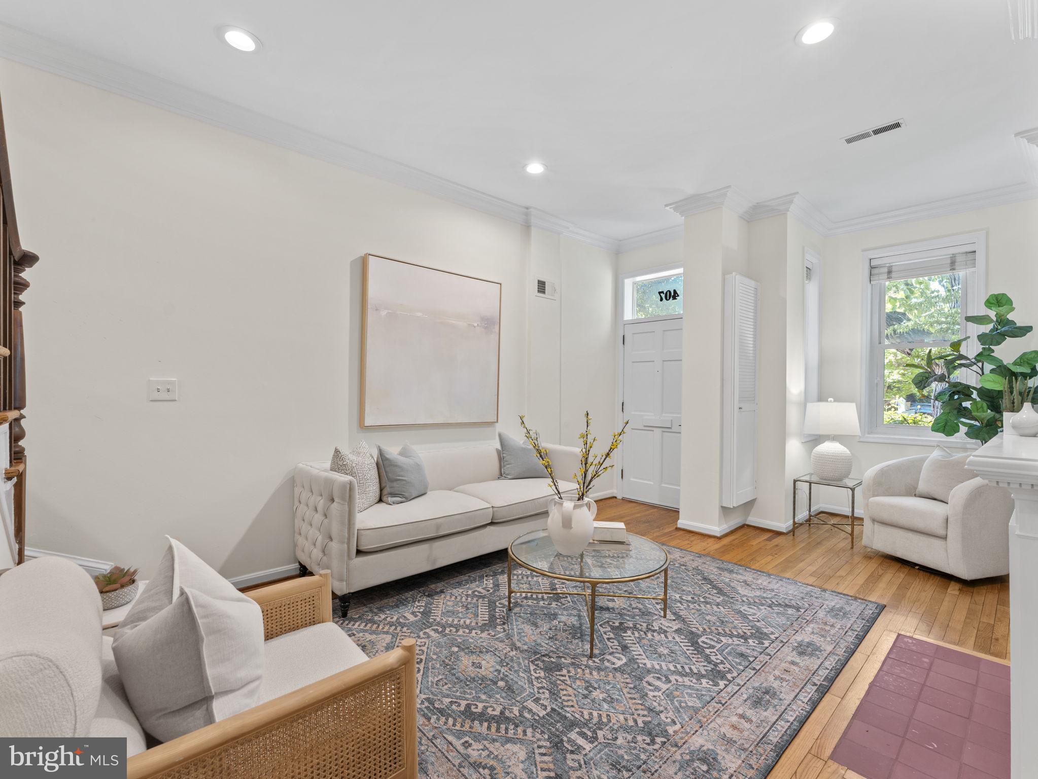 407 5th Street Northeast Washington, DC 20002 - Photo 5 of 41 a living room with furniture and a rug