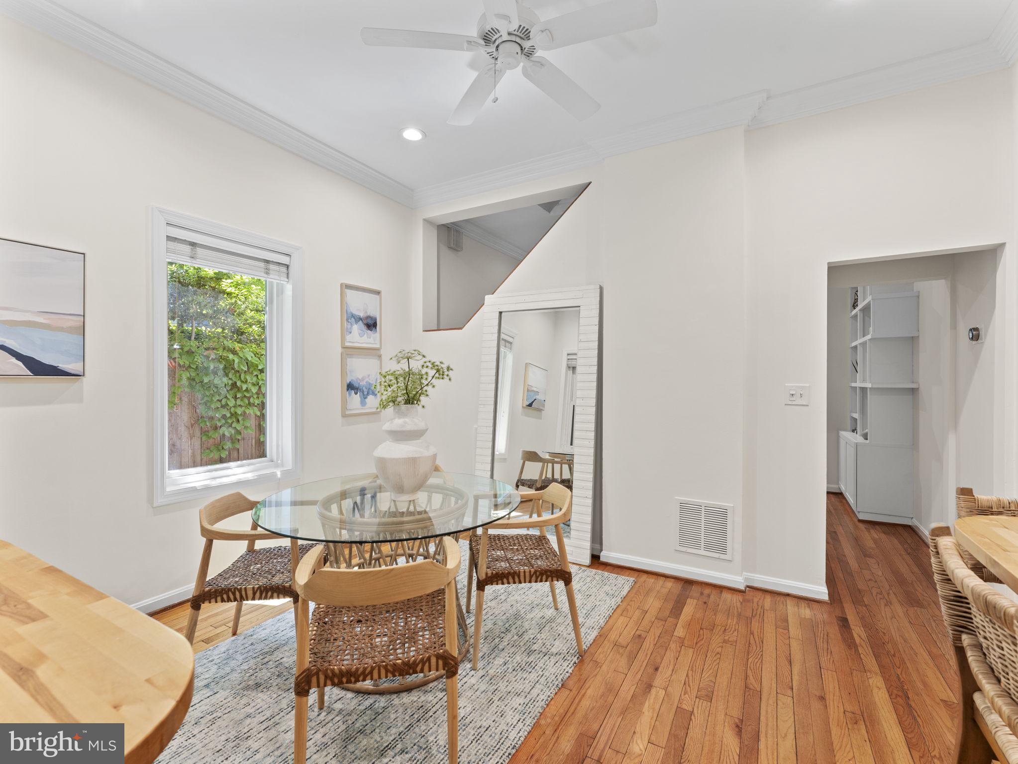 407 5th Street Northeast Washington, DC 20002 - Photo 10 of 41 a living room with furniture and a wooden floor