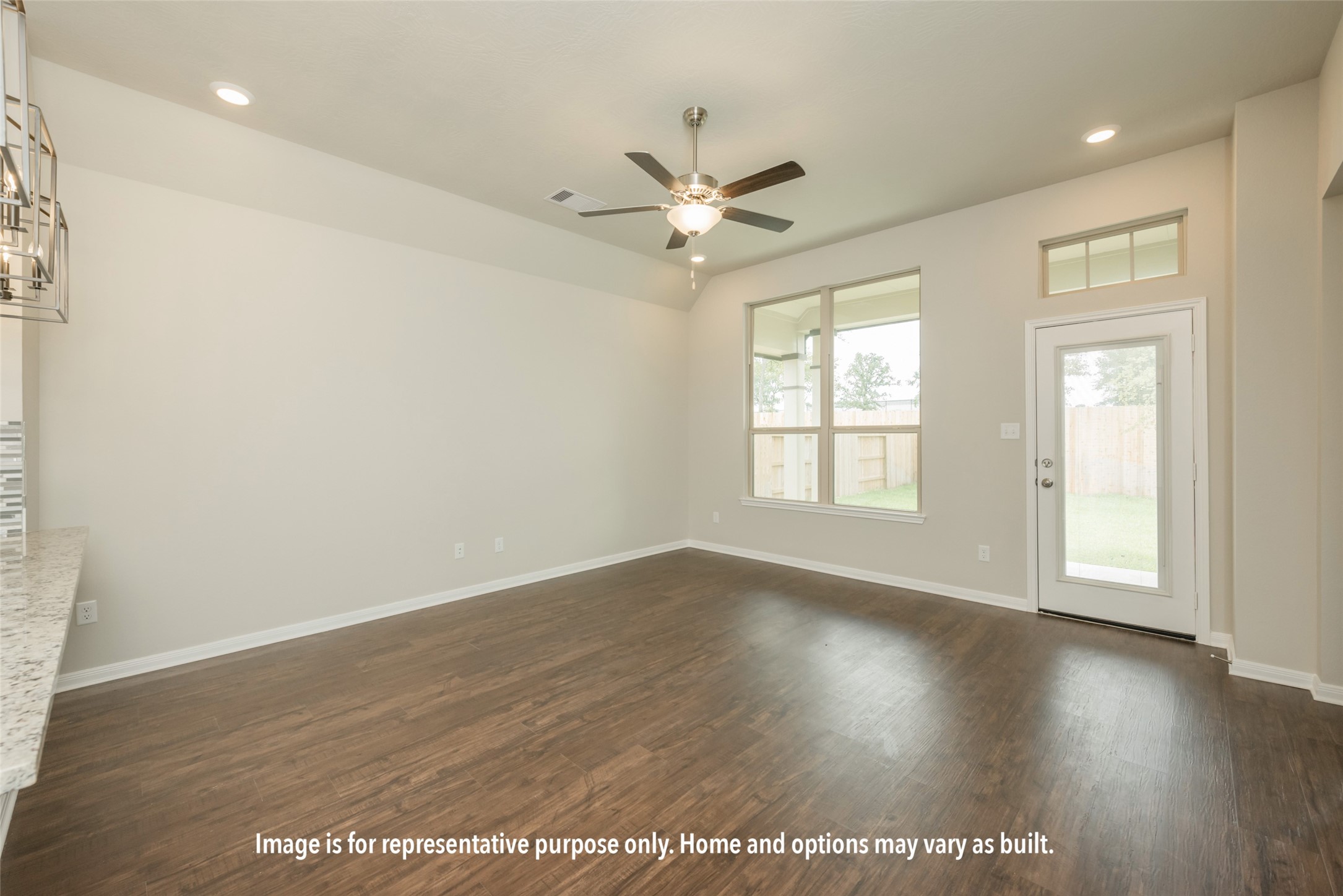 1498 Lk Rdg Drive Brenham, TX 77833 - Photo 15 of 15 an empty room with wooden floor fan and windows