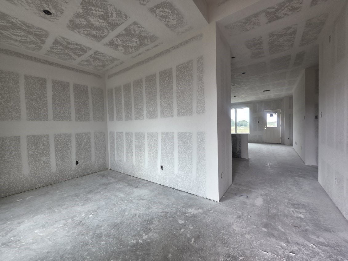 1498 Lk Rdg Drive Brenham, TX 77833 - Photo 2 of 15 an empty room with windows
