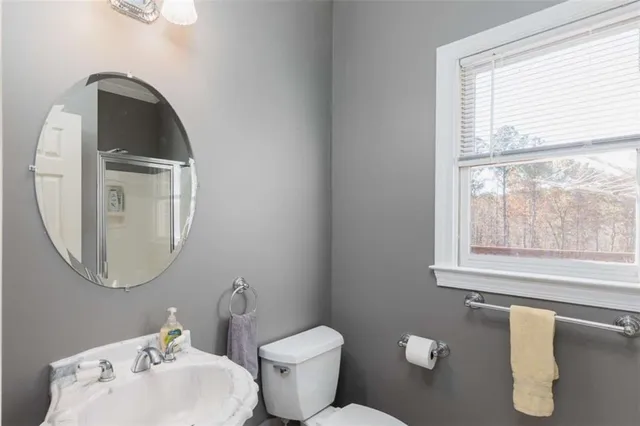 a kitchen with a refrigerator a stove top oven a sink and a refrigerator