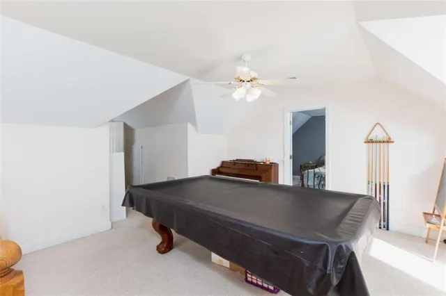 a view of storage and utility room with empty racks