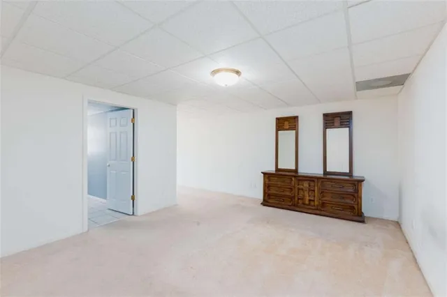 a view of a livingroom with furniture and chandelier