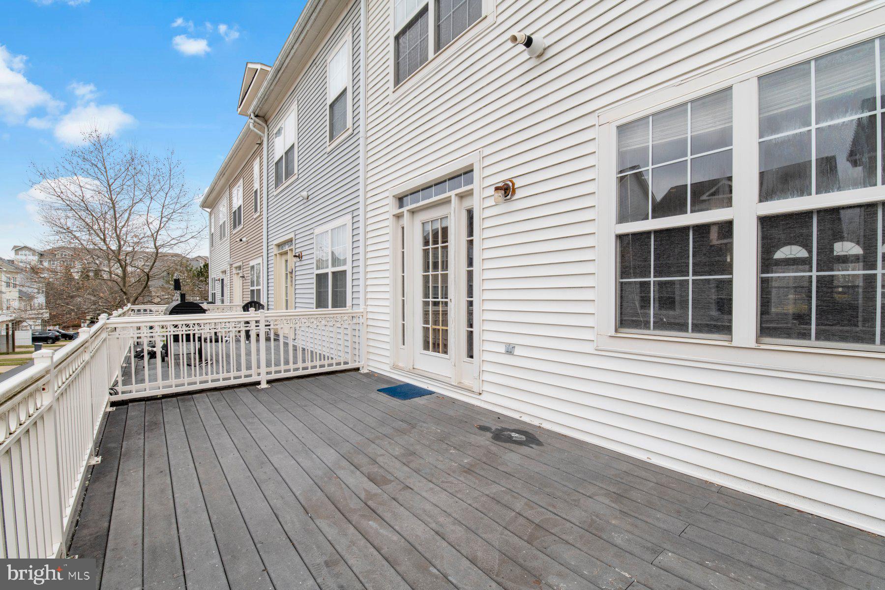12802 Brightwell Drive Clarksburg, MD 20871 - Photo 13 of 30 a view of a brick house with large windows
