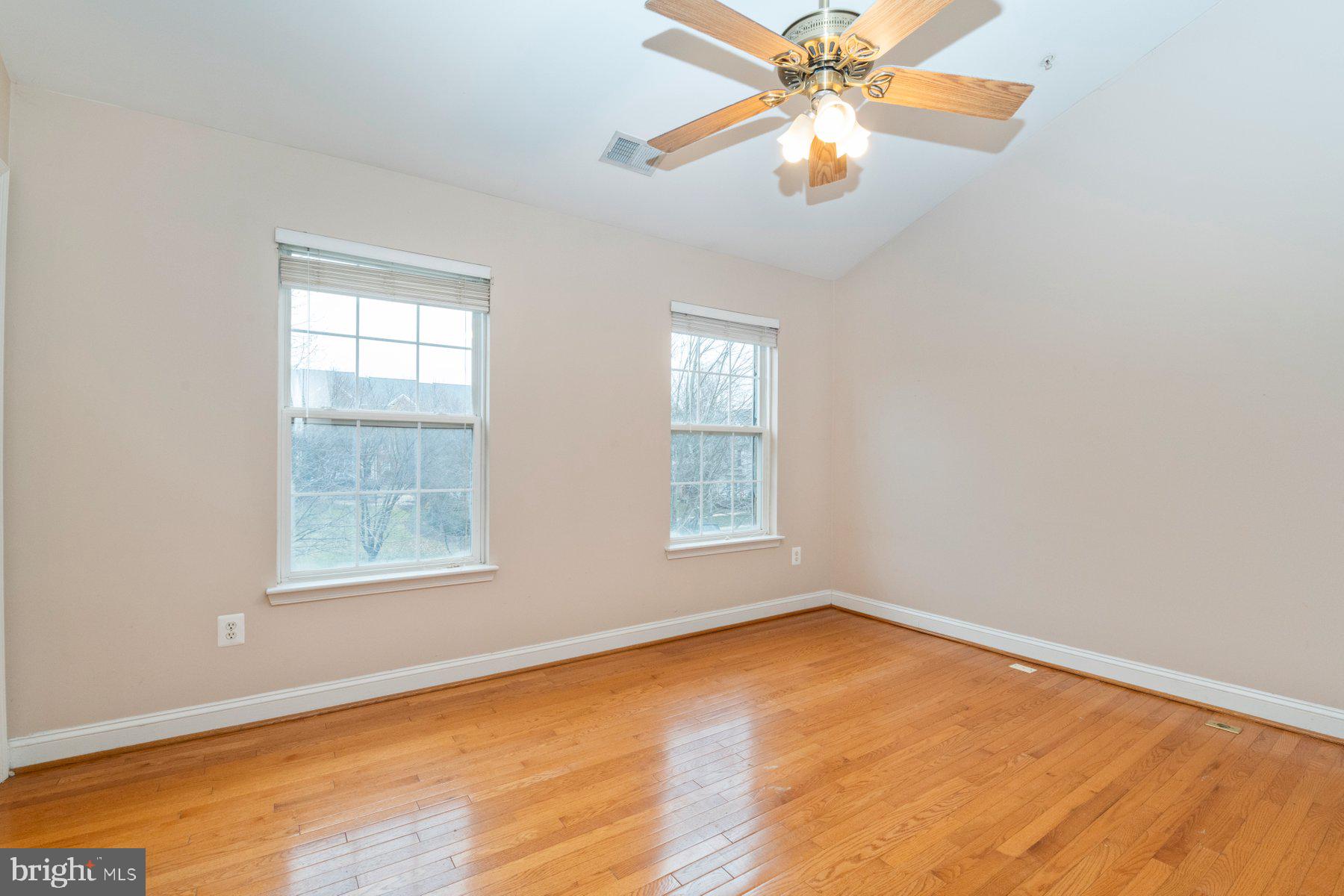 12802 Brightwell Drive Clarksburg, MD 20871 - Photo 18 of 30 an empty room with a window and a fan