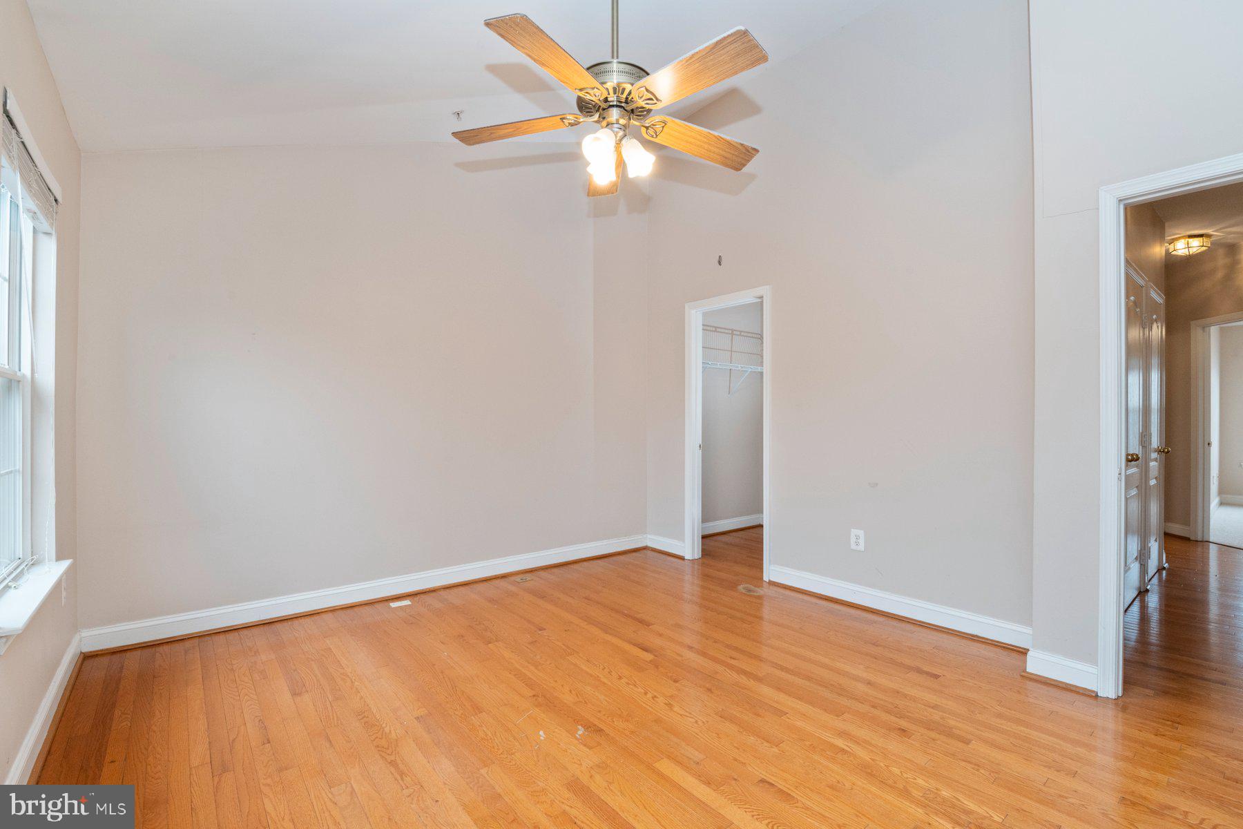 12802 Brightwell Drive Clarksburg, MD 20871 - Photo 19 of 30 wooden floor in an empty room with a window